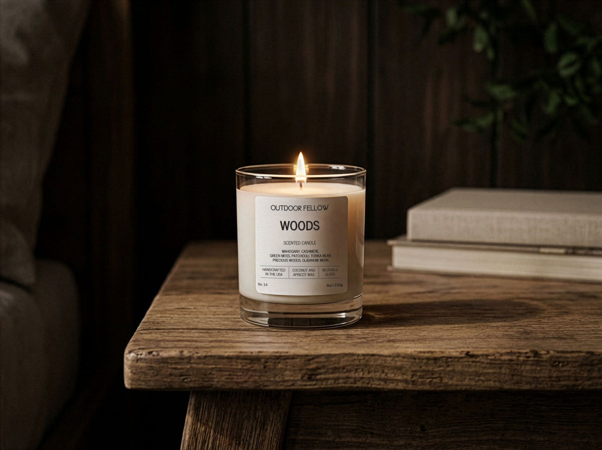 Woods scented candle on a wooden bench