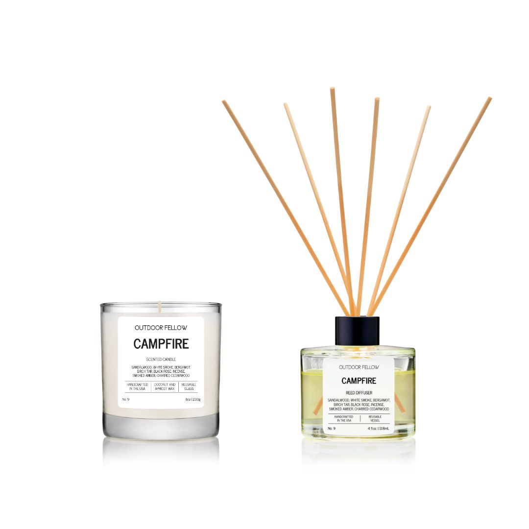 'Outdoor Fellow' Campfire scented candle and reed diffuser on a white background