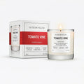 Scented candle labeled 'Tomato Vine' by Outdoor Fellow with packaging on a white background