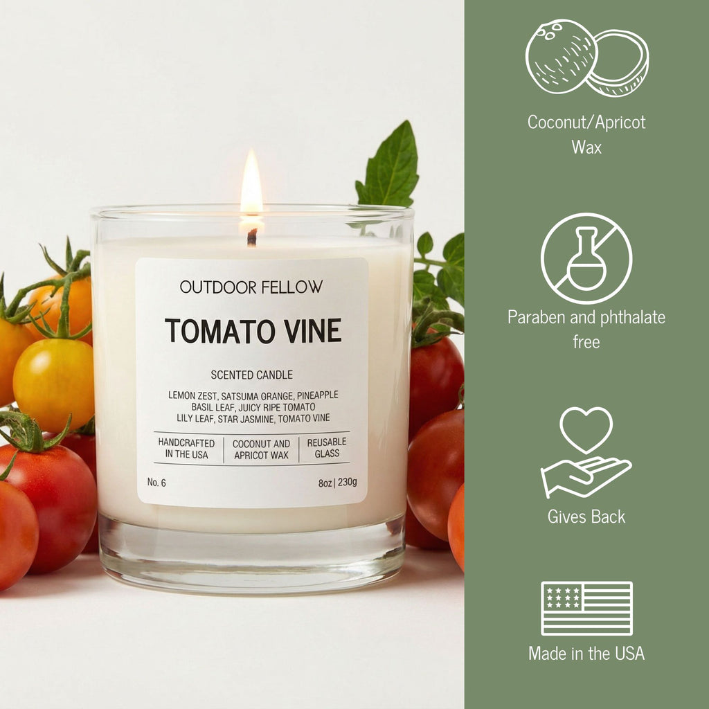 Candle labeled 'Tomato Vine' by Outdoor Fellow with product details on a green sidebar.