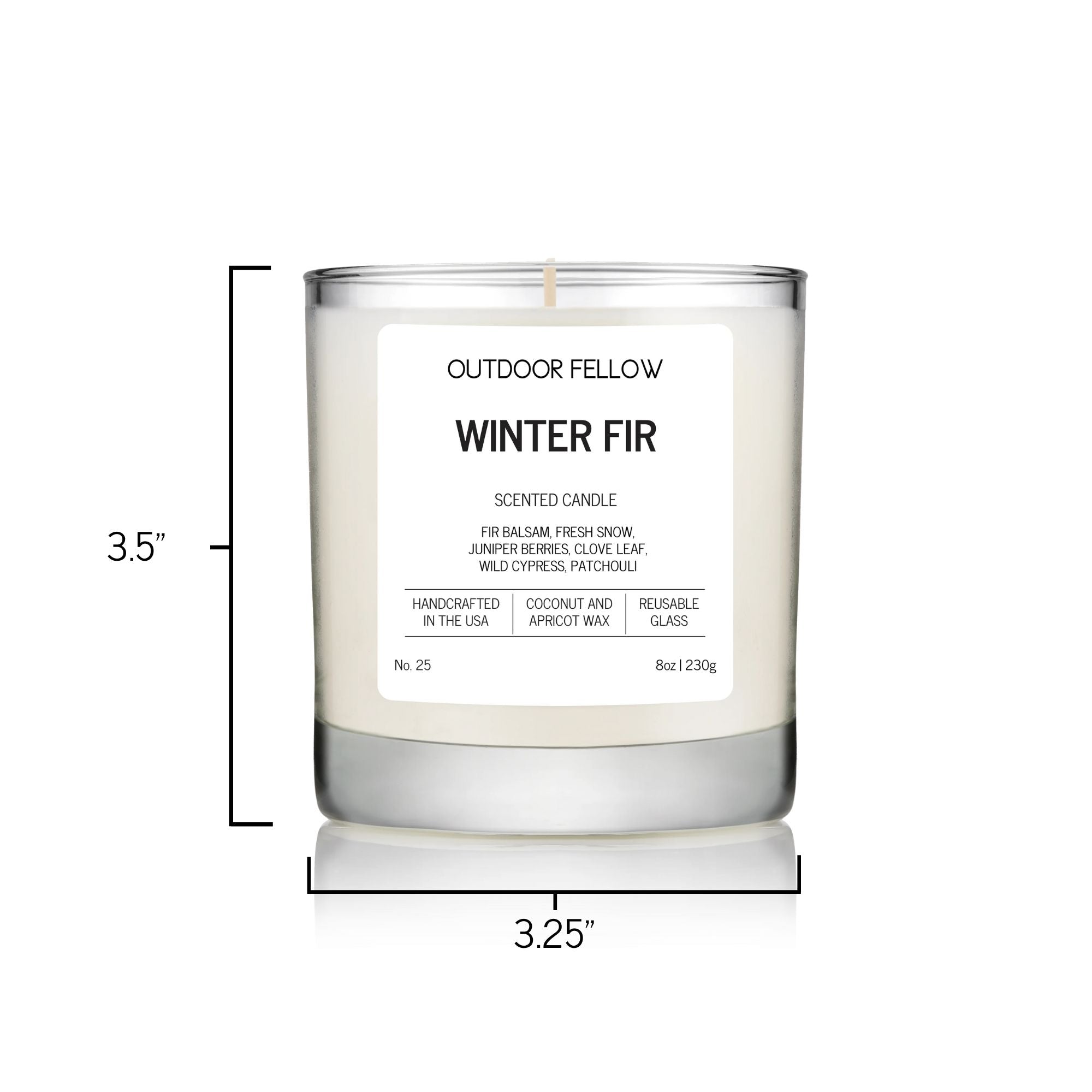 Outdoor Fellow Winter Fir candle with label shown, measuring 3.5 inches tall and 3.25 inches in diameter.
