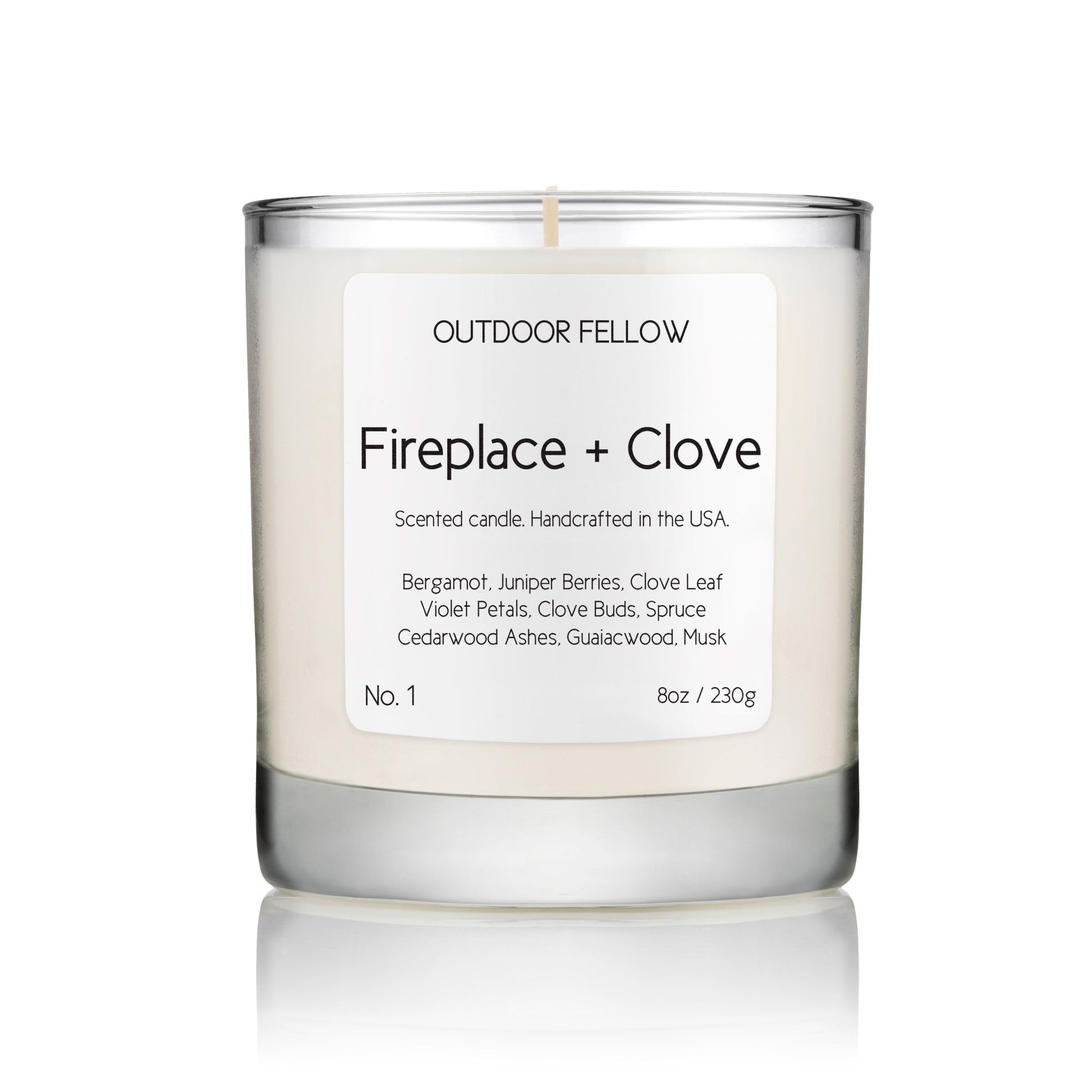 Fireplace and Clove scented candle on white background