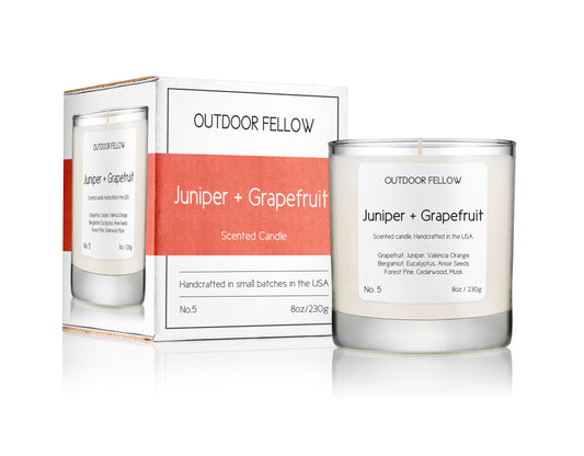 Juniper and Grapefruit scented candle and packaging composition