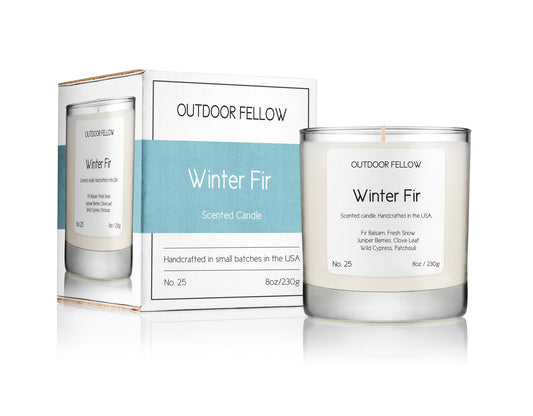 Winter Fir scented candle next to carton